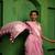 Huts and looms pink handloom cotton saree, featuring exquisite hand-painted floral designs throughout the saree.