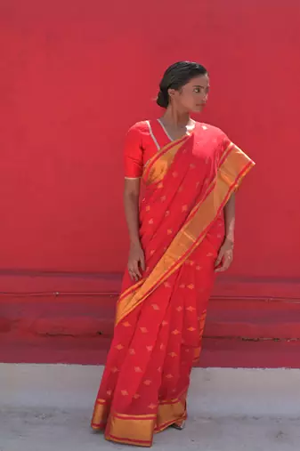 Huts and looms exquisite red handwoven cotton saree with golden jamdani motifs
