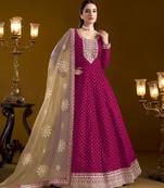 Rani pink embroidered jacquard chanderi semi stitched anarkali suit