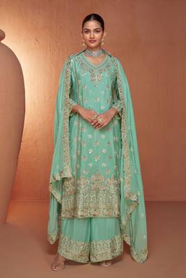 Turquoise embroidered chinnon  free size stitched straight palazzo suit. (size upto 42) 1