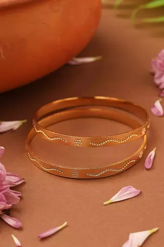 Gold-plated plain bangles with self-design pattern