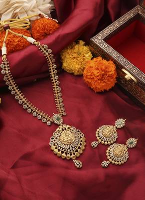 Gold-plated south temple style necklace set with american stone studded lakshmi motif pendant 1