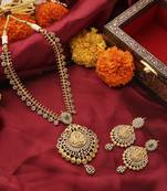 Gold-plated south temple style necklace set with american stone studded lakshmi motif pendant