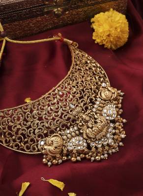 Gold-Plated Statement Choker Set with Lakshmi Motif and Intricate Designs 2