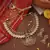 Gold-Plated Lakshmi Coin Necklace Set with Lotus Lakshmi Motif