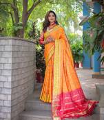 Soft patola silk rich pallu and contrast zari border all over the saree with brocade blouse
