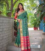 Soft patola silk rich pallu and contrast zari border all over the saree with brocade blouse