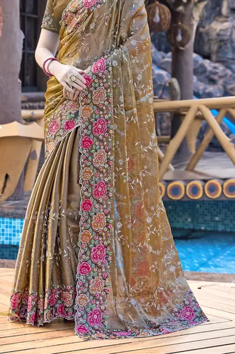 Siroski Resham Stone Embroidered Border Silk Saree In Brown With Matching Blouse Piece