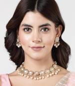 Women gold-plated kundan-studded  beaded necklace and earrings