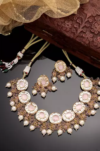 Women gold-plated kundan-studded  beaded necklace and earrings