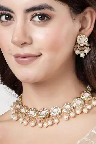 Women gold-plated kundan-studded  beaded necklace and earrings