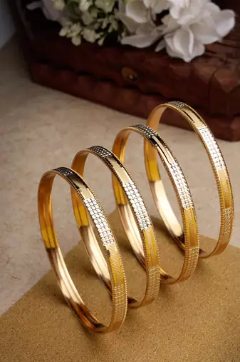 Women set of 4 gold-plated cz-studded traditional bangles
