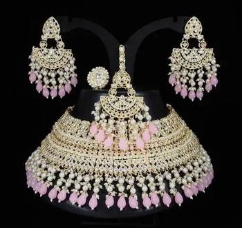 Opulent bridal kundan choker set with pink beads and matching earrings & maang tikka 1