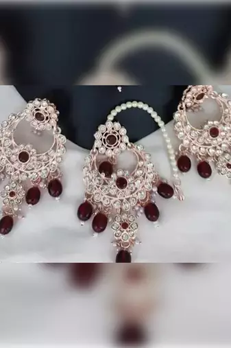 Luxurious silver-plated bridal jewelry set with ruby red accents