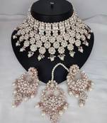 Luxurious silver-plated bridal jewelry set with white accents