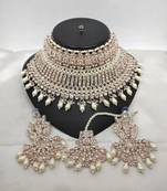 Exquisite crystal and pearl bridal choker set with matching earrings and tikka