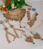 Kundan bridal jewelry set with pearl drops - wedding collection with choker, earrings, mathapatti & hand chain