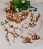 Kundan bridal jewelry set with pearl drops -  wedding collection with choker, earrings, mathapatti & hand chain