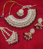 Luxurious wine color kundan bridal necklace set with maang tikka and earrings