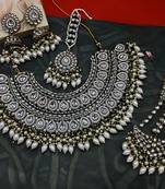 Exquisite kundan meena bridal necklace set with matching earrings and tikka