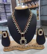 Elegant maroon and silver statement necklace set with matching earrings