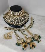 Opulent kundan bridal choker set with green beads - complete wedding jewelry collection