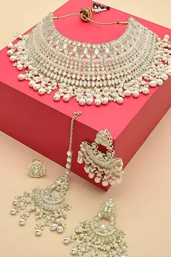 Opulent bridal kundan choker set with white beads and matching earrings & maang tikka