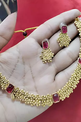 Designer gold floral Necklace :: set with ruby stones elegant matt gold finish jewelry set for women