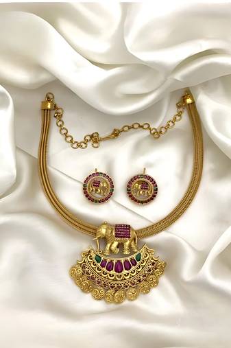 Antique gold elephant pendant necklace set with ruby & green stones | traditional south indian temple jewelry