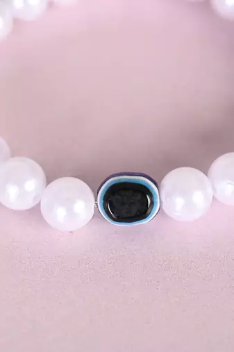 Unisex white evil eye crystal elasticated bracelet