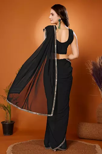 Black color pure georgette saree with blouse piece