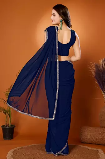 Navy blue color pure georgette saree with blouse piece
