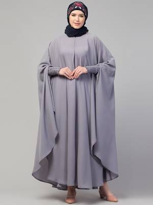 Nazneen smoking at sleeve Irani kaftan 1