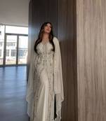 Grand White Kaftan Gown with Silver Stone and Zari Work | Luxury Wedding & Bridal Wear