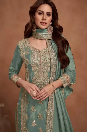 Green embroidered vichitra silk stitched palazzo suit