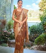 Exquisite designs with this mustard simar silk zari woven saree