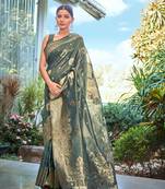 Exquisite designs with this cyan simar silk zari woven saree