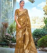 Exquisite designs with this coffee brown simar silk zari woven saree