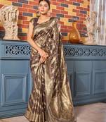 Exquisite designs with this coffee brown simar silk zari woven saree(
