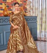 Exquisite designs with this rust simar silk zari woven saree(