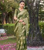 Exquisite designs with this light green simar silk zari woven saree