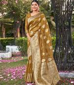 Exquisite designs with this mustard simar silk zari woven saree