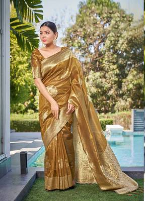 Exquisite designs with this mustard simar silk zari woven saree 1