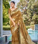 Exquisite designs with this mustard simar silk zari woven saree