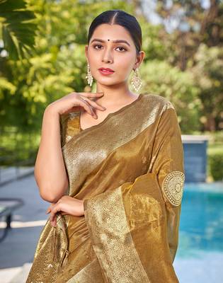 Exquisite designs with this mustard simar silk zari woven saree 2