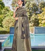 Exquisite designs with this grey simar silk zari woven saree