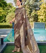 Exquisite designs with this coffee simar silk zari woven saree