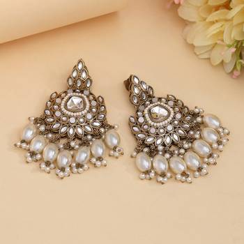 White color kundan earrings 1