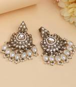White color kundan earrings