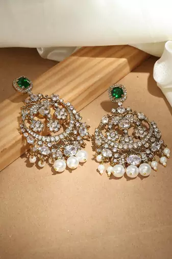 Kundan chandbali earrings with emerald stones